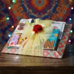 Chocolate confectionery and nuts gift hamper in decorative wooden tray with flowers by Tohfa Riwaz Mohali