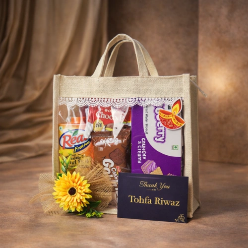 Eco friendly chocolate and confectionery gift hamper in decorative bag by Tohfa Riwaz Mohali