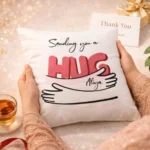 Premium white cushion with sending hug print and personalized note card