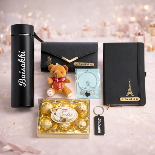 personalized-premium-gift-hamper-for-her-tohfa-riwaz-1 Personalized premium gift hamper for her with clutch diary water bottle chocolates and teddy by Tohfa Riwaz