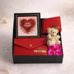 Romantic couple gift box featuring men and women wallets teddy bear and rose flowers