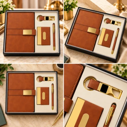 Premium tan brown personalized corporate gift set featuring a textured leatherette notebook with golden metal nameplate closure, matching brown and gold visiting card holder, elegant brown metallic pen with gold detailing and premium gold metal keychain with brown strap, arranged in a luxury black presentation box with ivory insert.