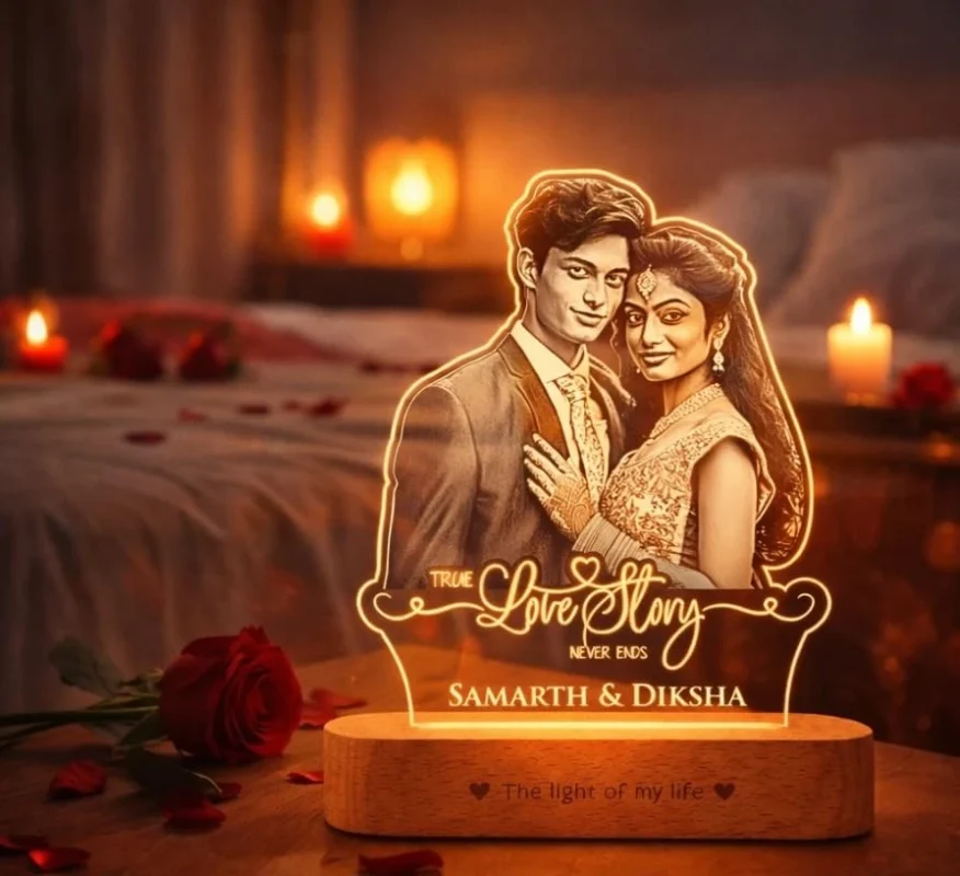 Personalized couple photo LED acrylic lamp featuring an engraved couple portrait, custom names and wooden base.