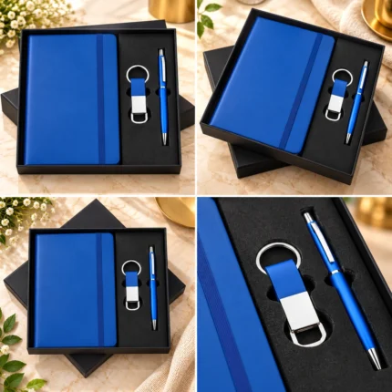 Premium personalized corporate gift set featuring a blue hardcover notebook with elastic closure, matching metallic finish pen and customized keychain, presented in an elegant black gift box. Available in black, blue, white and red.